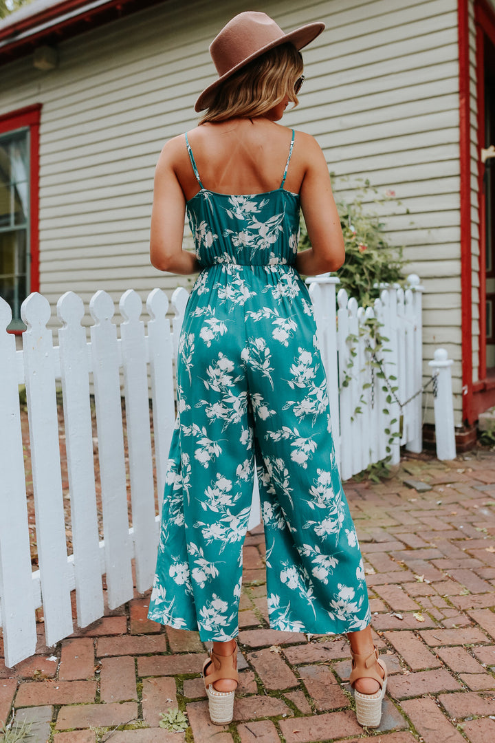 Perfekt blommig ärmlös jumpsuit med vida ben