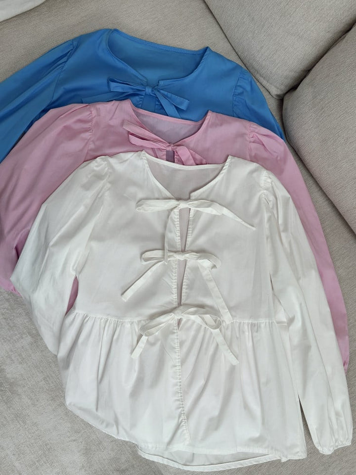 Bluse mit Schleifen und langen Ärmeln