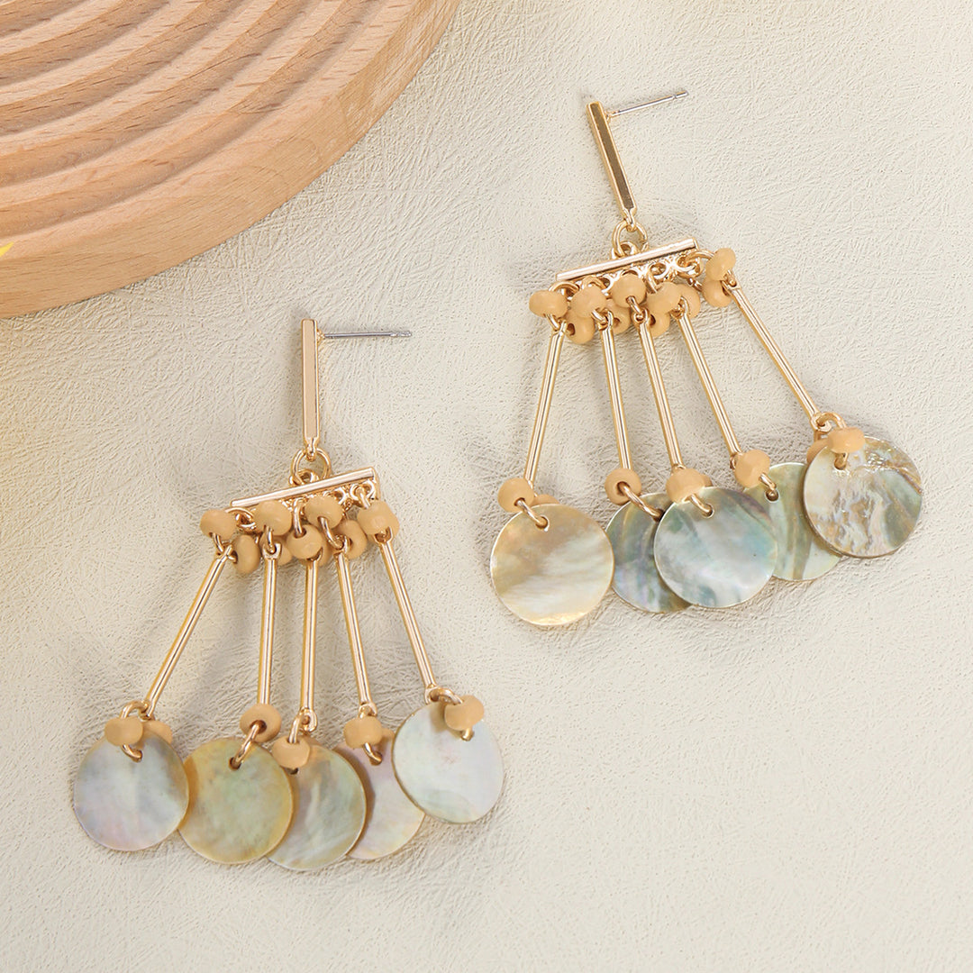 Pendientes con cuentas estilo boho con corte de concha