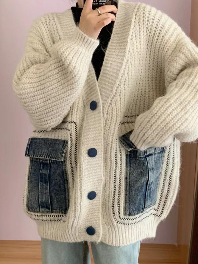 Unik cardigan med patchworkfickor i denim