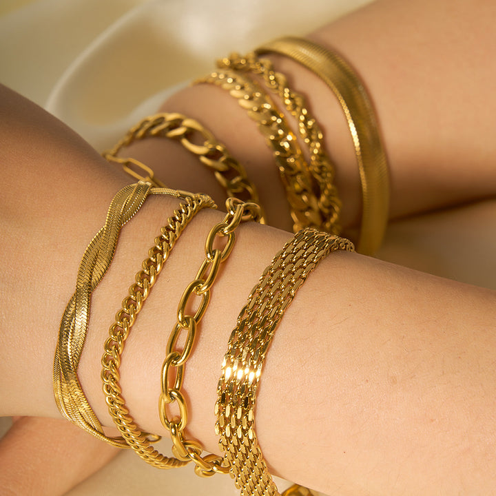 Pulseras de hueso de serpiente con cadena de acero y titanio dorado