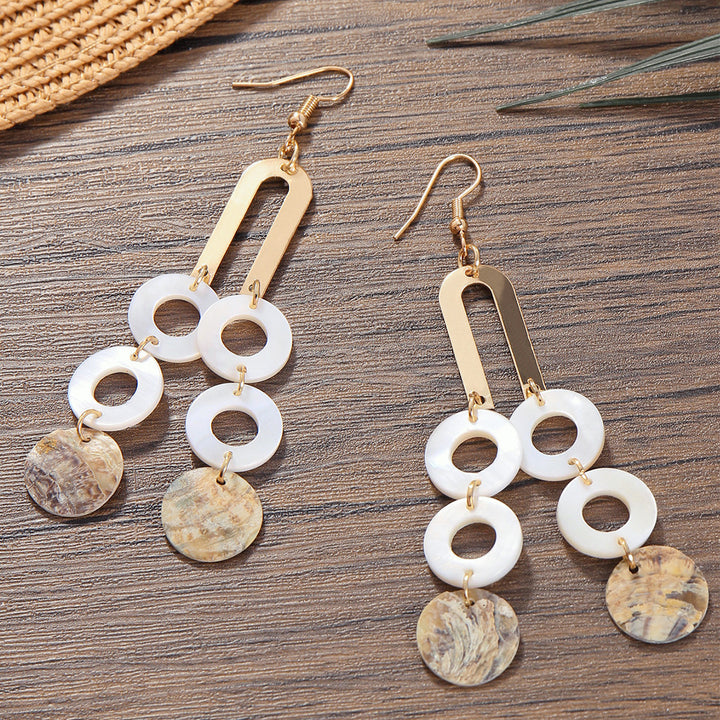 Pendientes con cuentas estilo boho con corte de concha