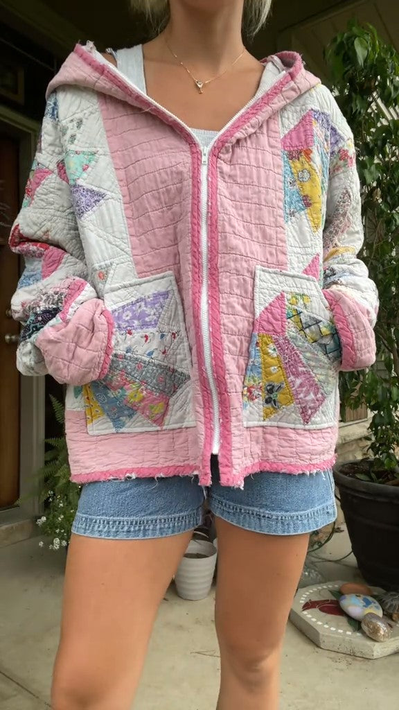 Cardigan rosa com zíper desfiado